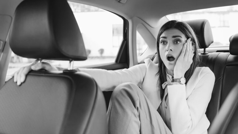 scared woman holding hand on face while sitting on 2023 11 27 05 05 06 utc in category Car Accident